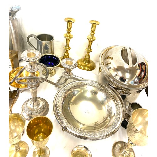 246 - Large selection of assorted metal ware includes Candle sticks, brass, silver plate etc