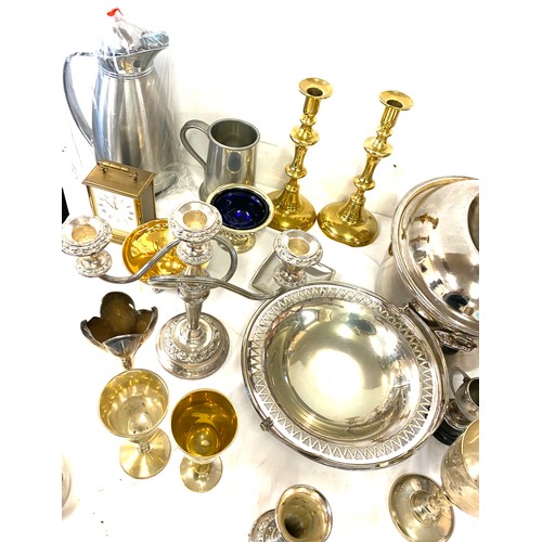 246 - Large selection of assorted metal ware includes Candle sticks, brass, silver plate etc