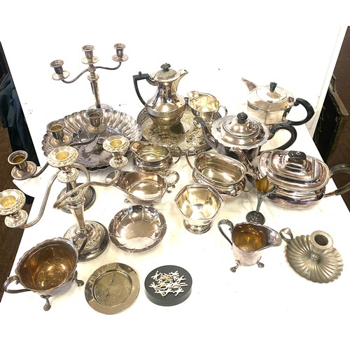 242 - Large selection of silver plated items includes Jugs, Tea pot, candle sticks etc