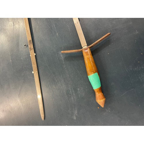 355 - Pair of wooden handled wall hanging swords