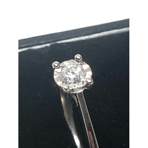 63 - 9ct white gold 0.20 ct diamond ring weight 2.2g