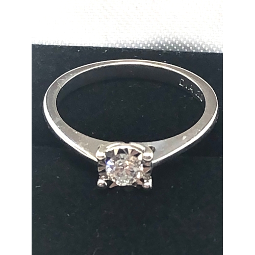 63 - 9ct white gold 0.20 ct diamond ring weight 2.2g