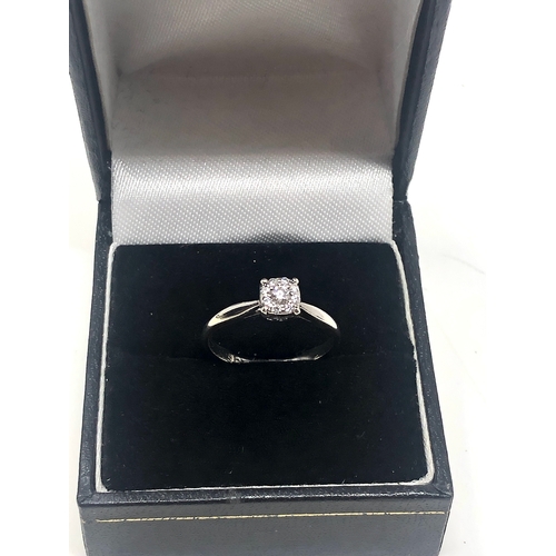 64 - 9ct white gold diamond ring weight 2g