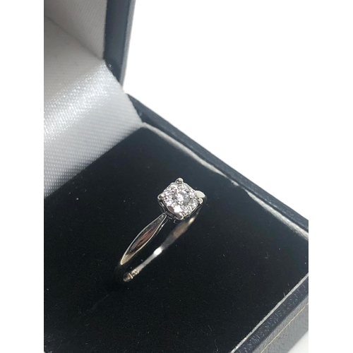 64 - 9ct white gold diamond ring weight 2g