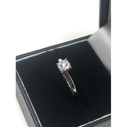 64 - 9ct white gold diamond ring weight 2g