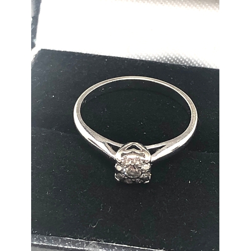 64 - 9ct white gold diamond ring weight 2g