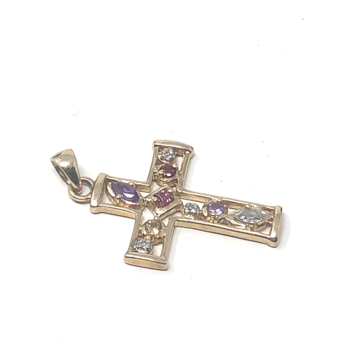 65 - 9ct gold gemstone set cross pendant diamond amethyst garnet etc weight 2.1g