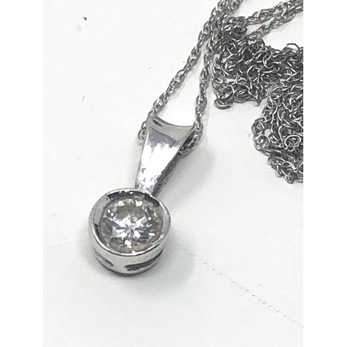 67 - 9ct white gold 0.25ct diamond pendant necklace