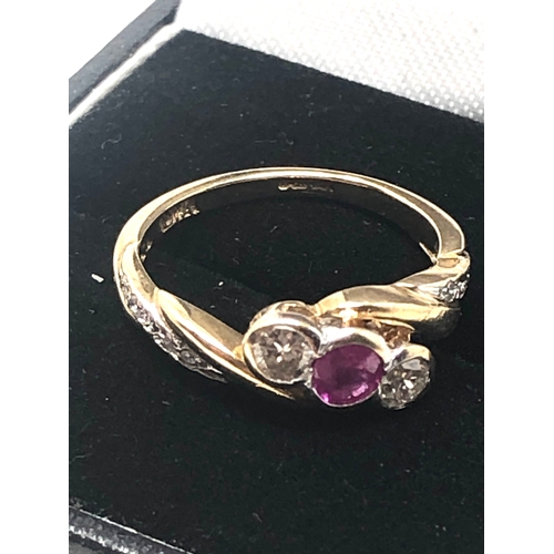 70 - 9ct gold 0.50ct diamond & ruby ring weight 2.4g