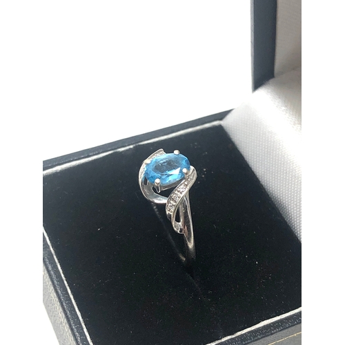 73 - 9ct white gold topaz & stone set  ring weight 2.1g