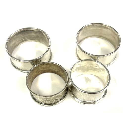 595 - 4 Silver napkin rings