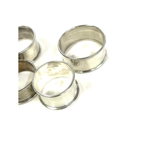 595 - 4 Silver napkin rings