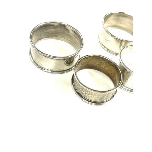 595 - 4 Silver napkin rings