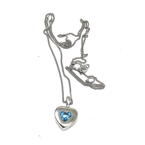 76 - 9ct white gold topaz heart pendant necklace weight 1.8g