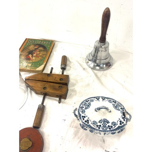 251 - Miscellaneous to include a supper bell, book and a Cocks and Dunsford cookie jar