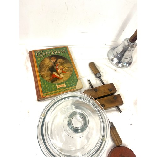 251 - Miscellaneous to include a supper bell, book and a Cocks and Dunsford cookie jar