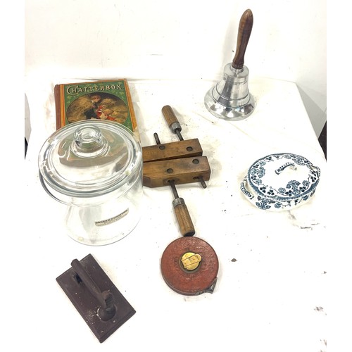 251 - Miscellaneous to include a supper bell, book and a Cocks and Dunsford cookie jar