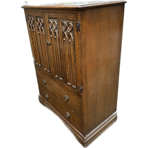389 - Oak 2 door, 2 drawer tallboy, approximate measurements: Height  47 inches, Width 34.5 inches, Depth ... 