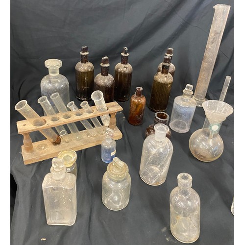 275 - Large selection of vintage and later glass bottles includes medicine bottles, test tubes etc