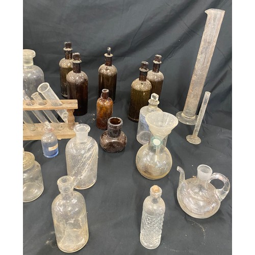 275 - Large selection of vintage and later glass bottles includes medicine bottles, test tubes etc