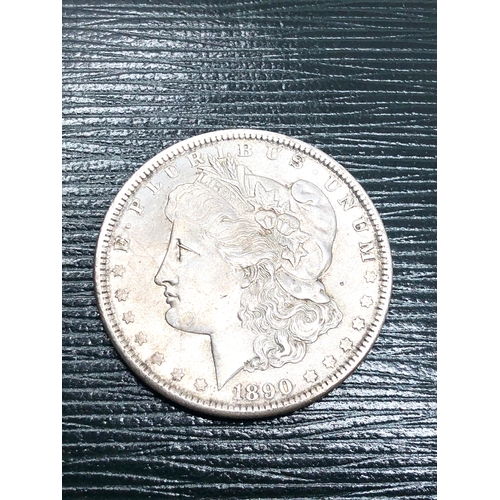 493 - 1890 Morgan silver dollar