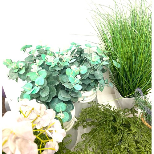 240 - Large selection of artificial plants in pots