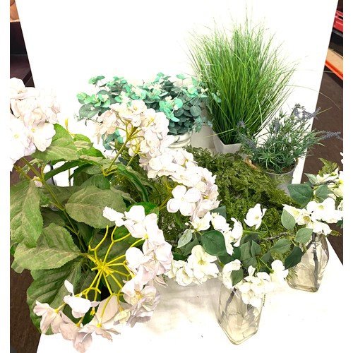 240 - Large selection of artificial plants in pots