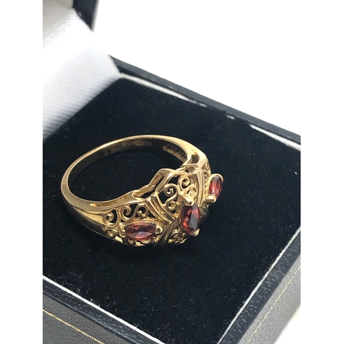 79 - 9ct gold garnet ring weight 2.6g