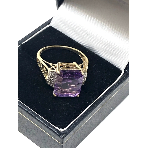 83 - 9ct gold amethyst & diamond statement ring weight 4g