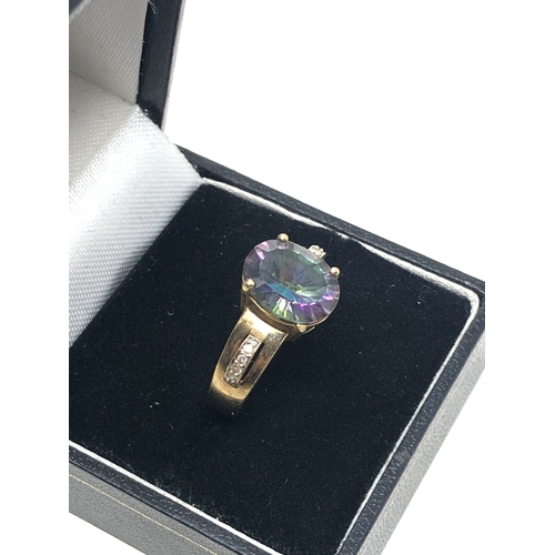 85 - 9ct gold mystic topaz & diamond ring weight 4.5g