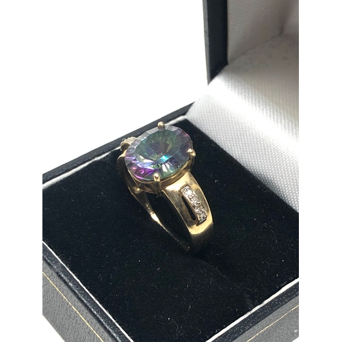 85 - 9ct gold mystic topaz & diamond ring weight 4.5g