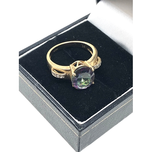 85 - 9ct gold mystic topaz & diamond ring weight 4.5g