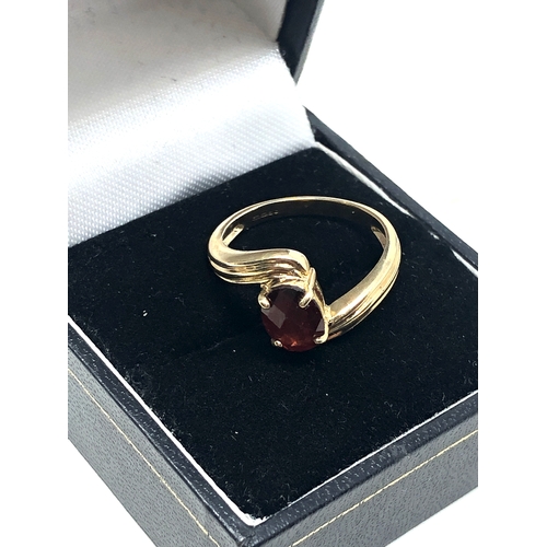 89 - 9ct gold  garnet statement ring weight 3.1g