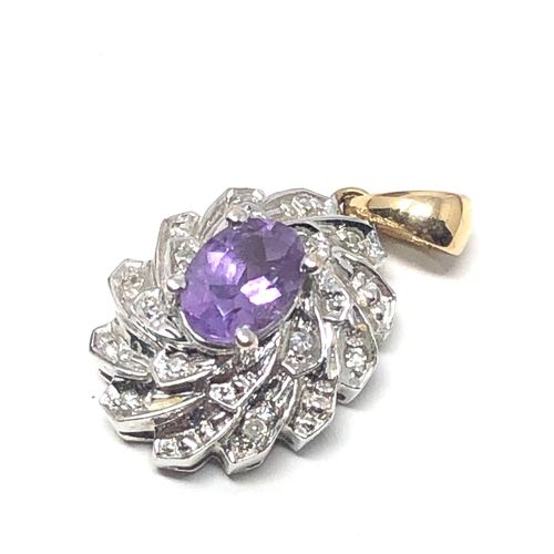 96 - 9ct white & yellow gold amethyst & diamond pendant measures approx 2.2cm drop weight 2.9g