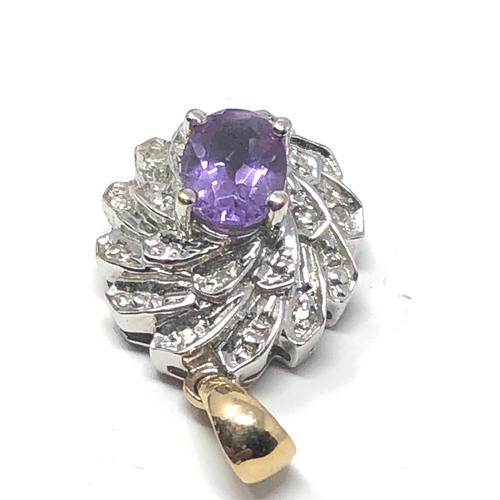 96 - 9ct white & yellow gold amethyst & diamond pendant measures approx 2.2cm drop weight 2.9g