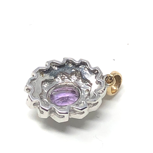 96 - 9ct white & yellow gold amethyst & diamond pendant measures approx 2.2cm drop weight 2.9g