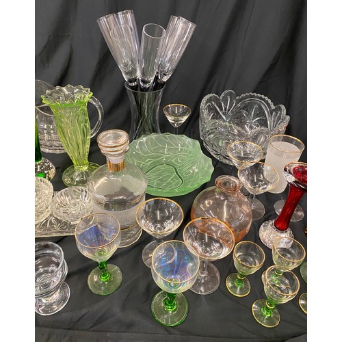 206 - Large selection of vintage and later glassware includes green glass vase, champagne flute