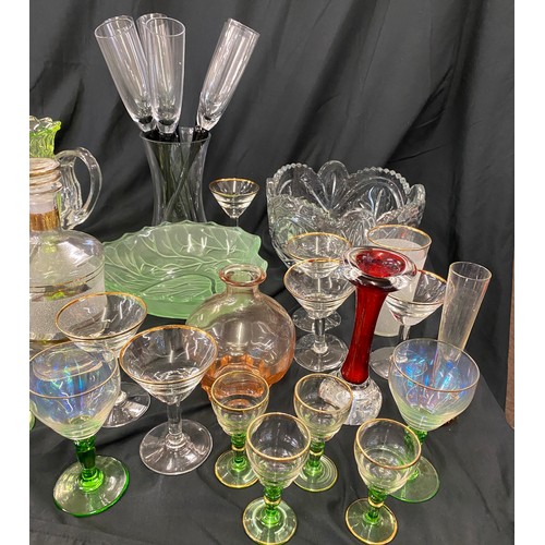 206 - Large selection of vintage and later glassware includes green glass vase, champagne flute