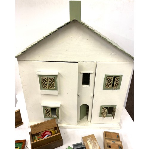 238 - Vintage wooden dolls house and accessories 24 inches tall 27 inches wide 11.5 inches depth