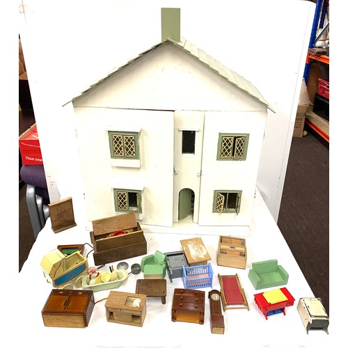 238 - Vintage wooden dolls house and accessories 24 inches tall 27 inches wide 11.5 inches depth