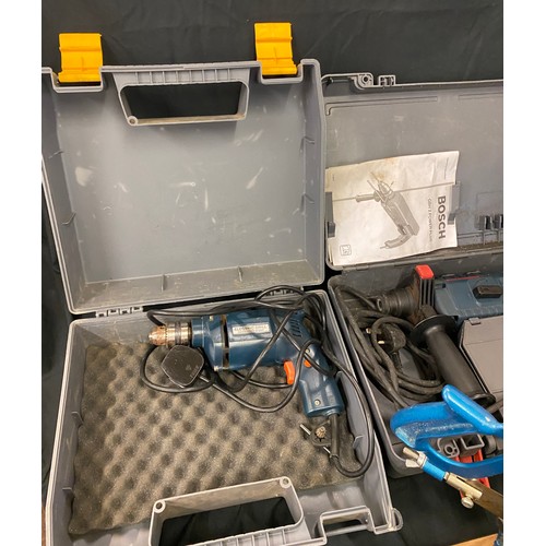 291 - 2 Bosch drills, in need of repair and a mitre saw