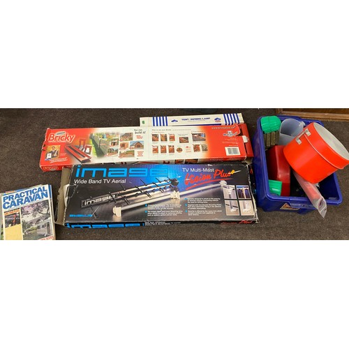 312 - Large selection of camping equipment includes Tent horning and an image tv aerial, magazines, cookin... 