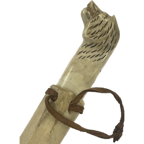 532 - Tribal art Sami knife, bone handle and scabbard, decorated with reindeer and sledge, hilt is the sha... 