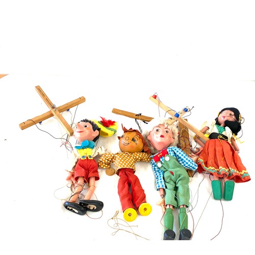 754 - Selection of puppets to include Pelham puppet Pinocchio, Geppetto etc