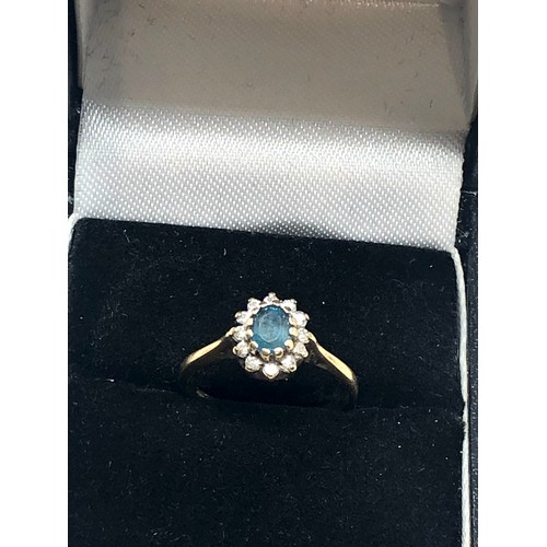 272 - 9ct gold diamond & topaz halo dress ring (1.6g)