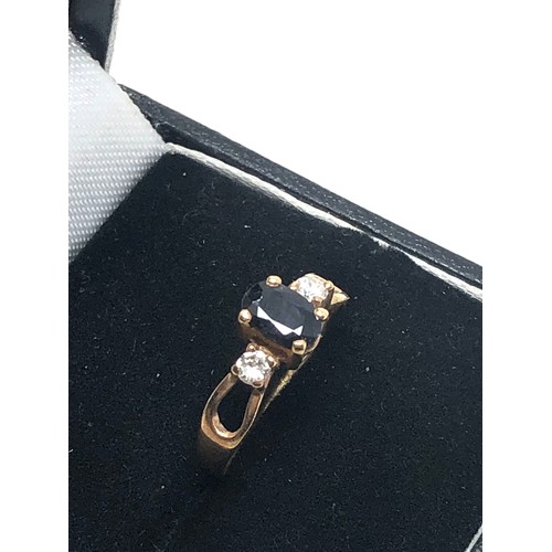 268 - 9ct gold vintage diamond & sapphire trilogy ring (1.2g)