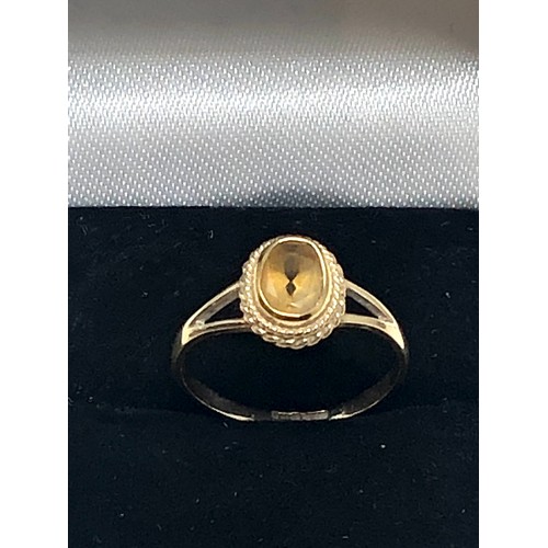 282 - 9ct gold citrine bezel ring (1.5g)