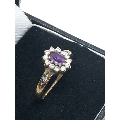 243 - 9ct gold vintage amethyst & clear gemstone halo dress ring (2.5g)