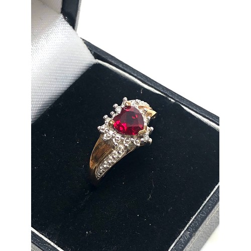 210 - 9ct gold synthethic ruby heart & diamond cluster dress ring (2.1g)