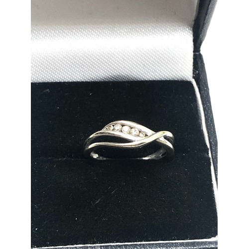 271 - 9ct gold diamond twist ring (1.5g)